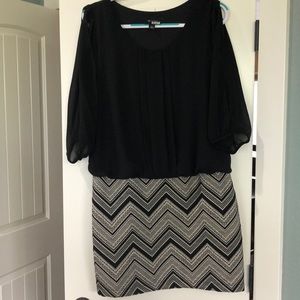 Large Dress with open arms.